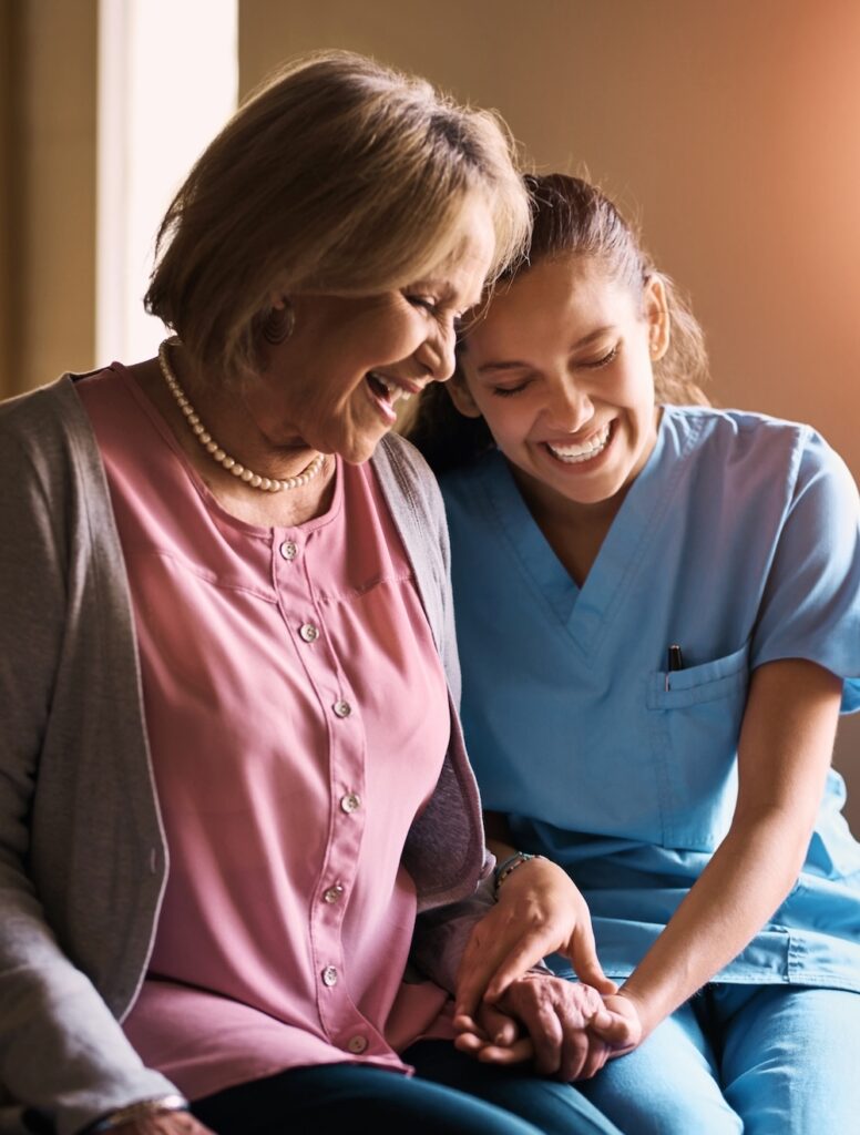 Nurse comforting a senior woman at Mississauga women’s clinic — trusted Women’s Health Services